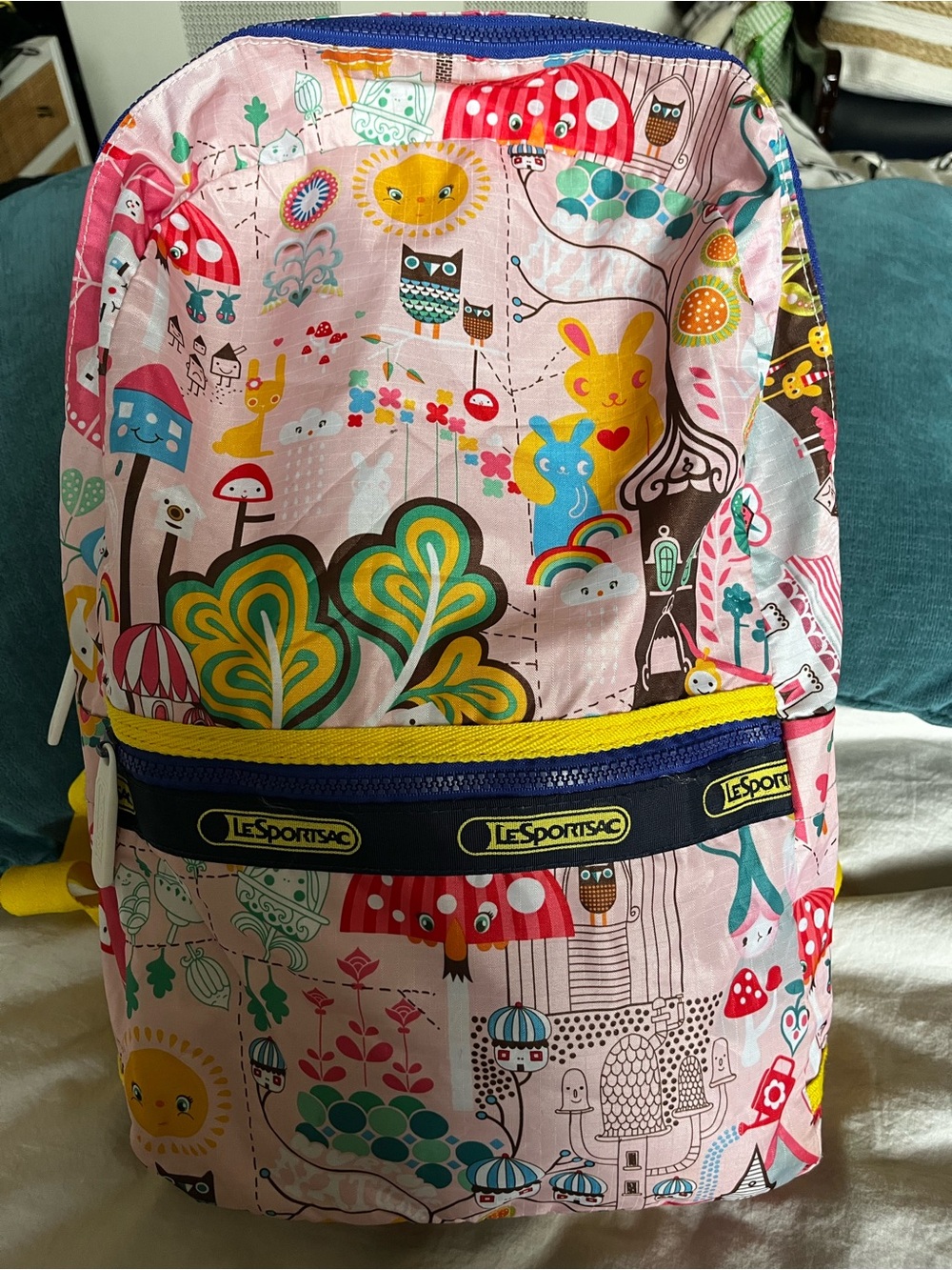 Lesportsac Gray Pouch Interior with Yellow Logo Trim and Blue Zipper
